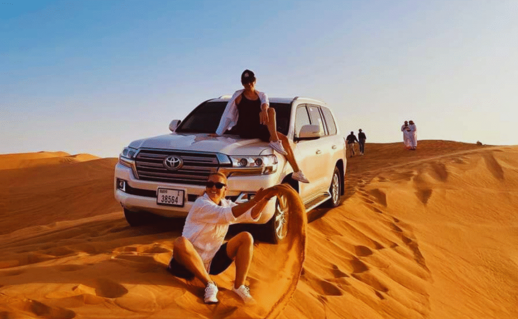 Dune bashing in land cruser desert safari in abu dhabi
