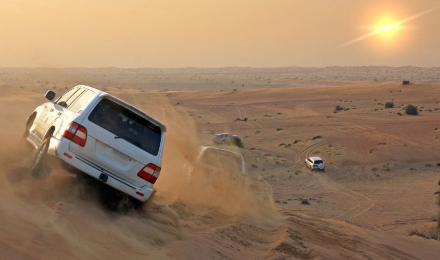 Dune Bahing in Land Cruser duringmorning desert safari in abu dhabi